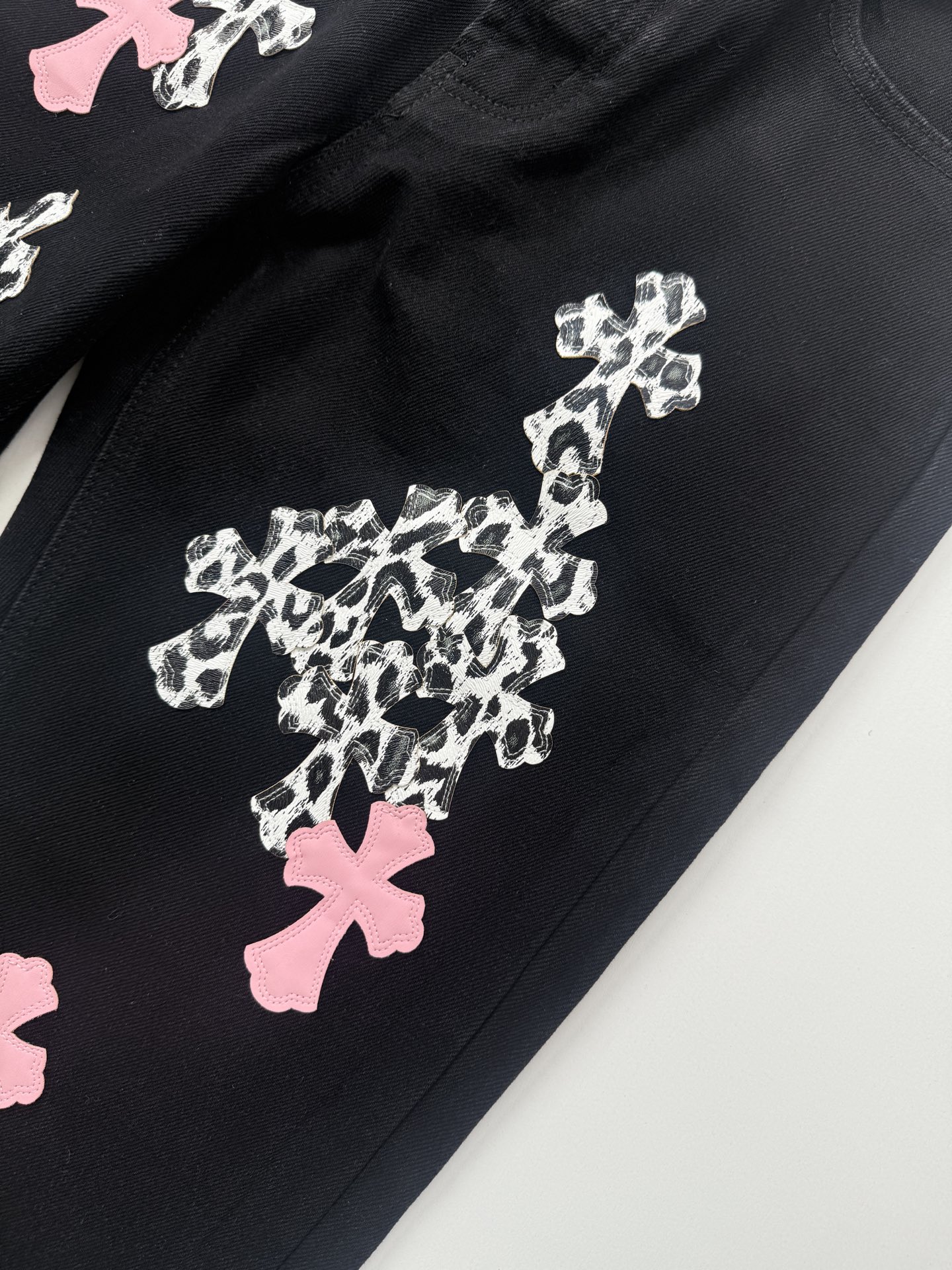 Chrome Hearts Black and Pink Leopard-Print Patchwork Leather Cross-Design Jeans - Image 6