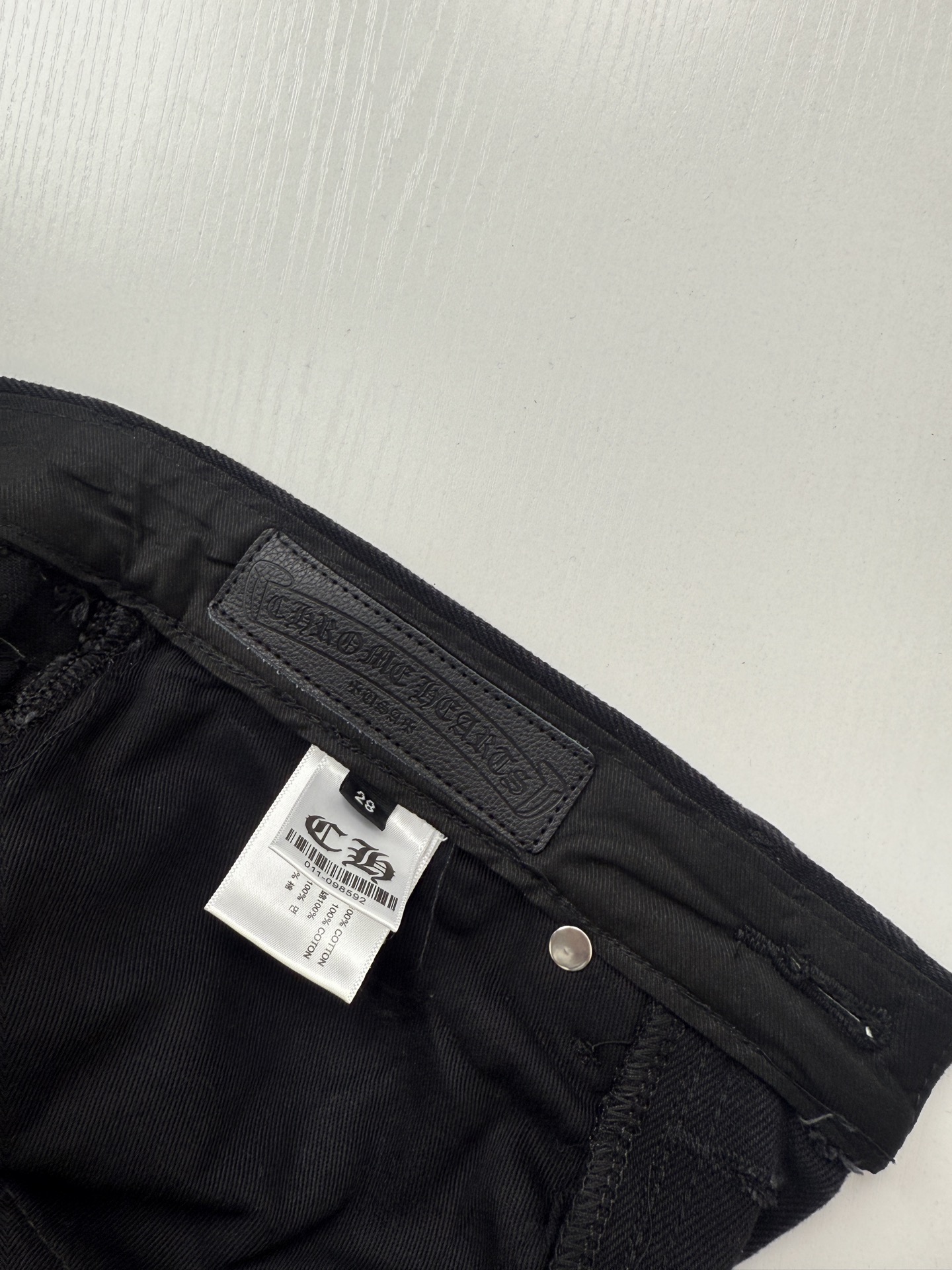 Chrome Hearts Black and Pink Leopard-Print Patchwork Leather Cross-Design Jeans - Image 11